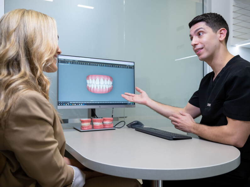 Dentist Conversing With The Patient At Delight Dental Spa Mascot, Sydney