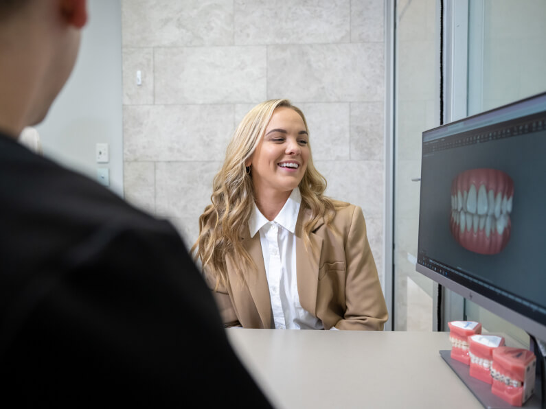 Patient Looking At The Monitor At Delight Dental Spa Mascot, Sydney